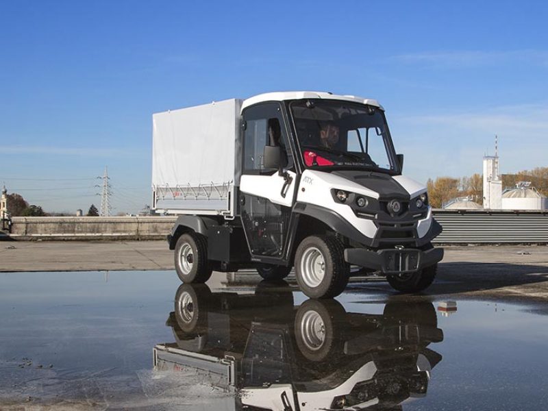 Vehicles With Body Tarp - Industrial Electric Vehicles